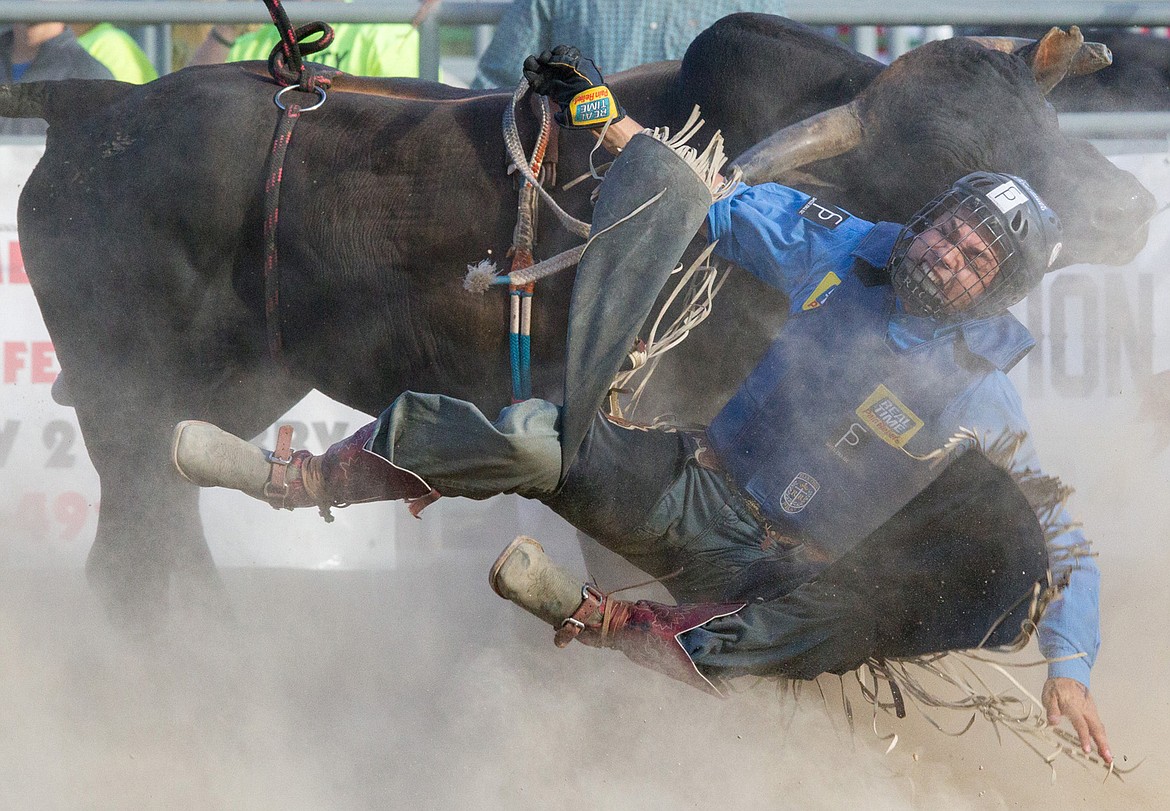 This photo of Shawn Best II of Omak, Washington, competing in Incredi-Bull at Libby&#146;s J. Neils Park in June 2017, won first place in the best sports photo category. (John Blodgett/The Western News file photo)