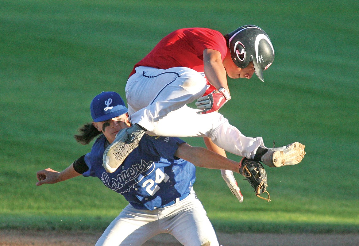 This photo of Logger shortstop Jesse Dunham tagging out Peyton won second place in the best sports photo category. (Paul Sievers/The Western News file photo)