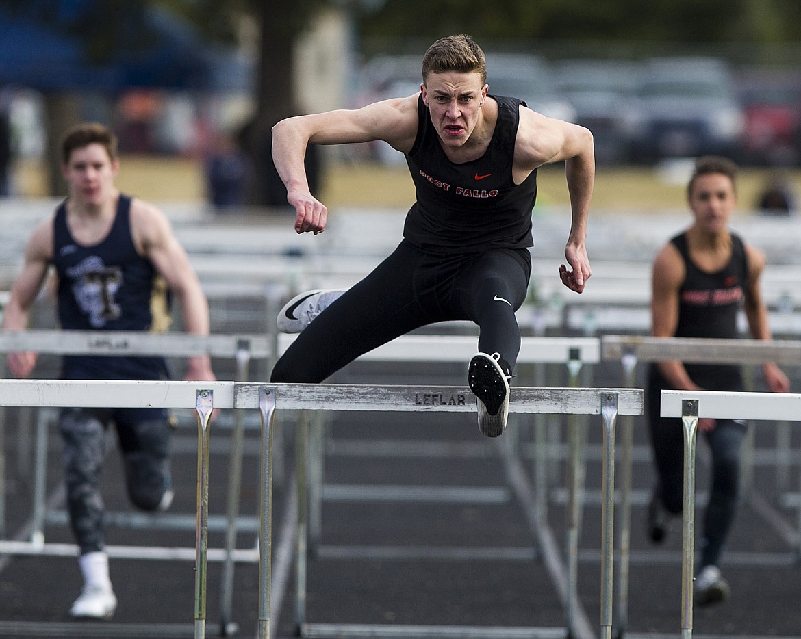 Post Falls&#146; Alan Ballew leaps over his last hurdle on his way to a first-place finish in the 110-meter hurdles at the Kootenai County Challenge track meet on April 6 at Timberlake High School.
