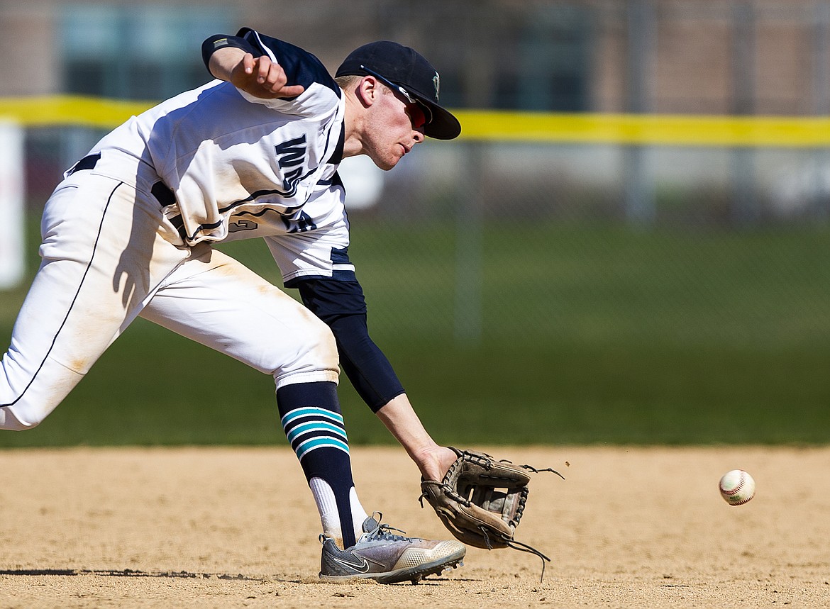 Lake City shortstop Kodie Kolden fields a sharp ground ball in a game against Lewiston on April 20.