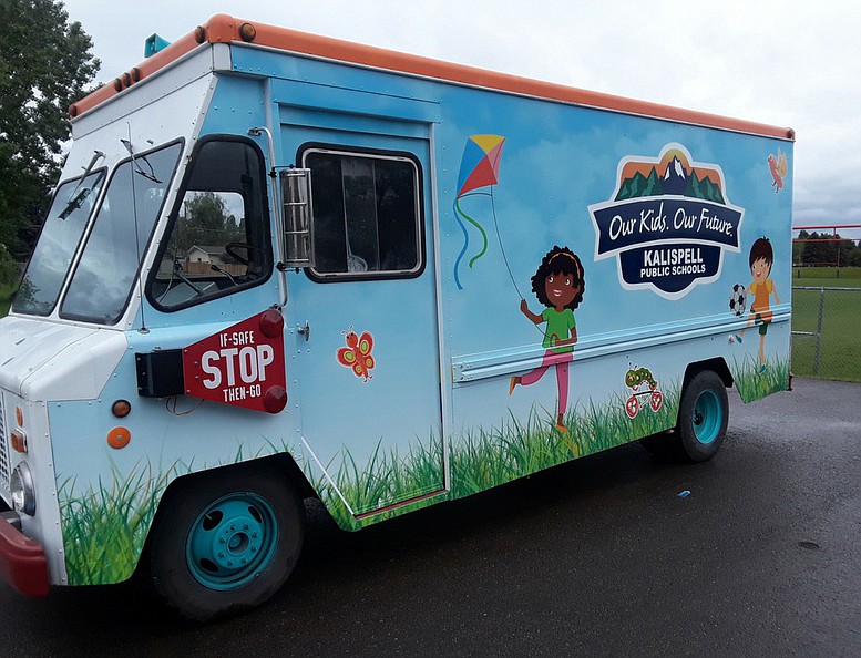 Kalispell Public Schools food trucks, like the one shown in this file photo, will serve free breakfasts and lunches to children and teens at sites throughout Kalispell and Evergreen on weekdays from June 16 through Aug. 20, 2021. No registration, proof of income or identification will be required. (Johnny Pena)