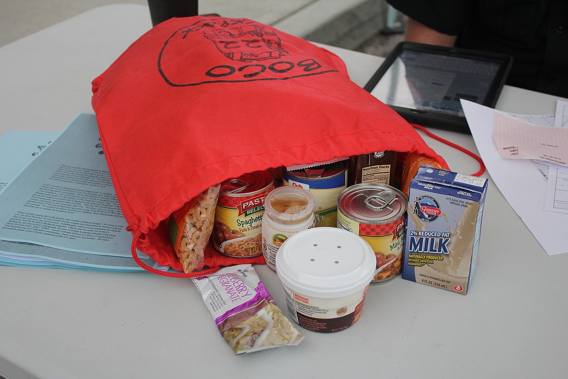 Photo by TANNA YEOUMANS
Super 1 Foods in Bonners Ferry utilized their sixth anniversary bash to raise funds for the BoCo Backpack program, which provides food to kids in need.