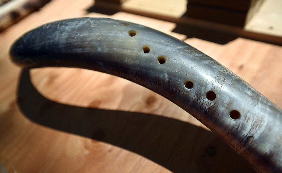 Niko Keys of Cedar Cabin Music also makes flutes out of different types of horns, like this longhorn horn.(Brenda Ahearn/Daily Inter Lake)