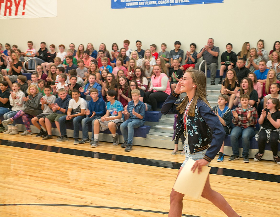 Maddie Robison gets cheers from classmates after being named the outstanding eighth grader for 2018.