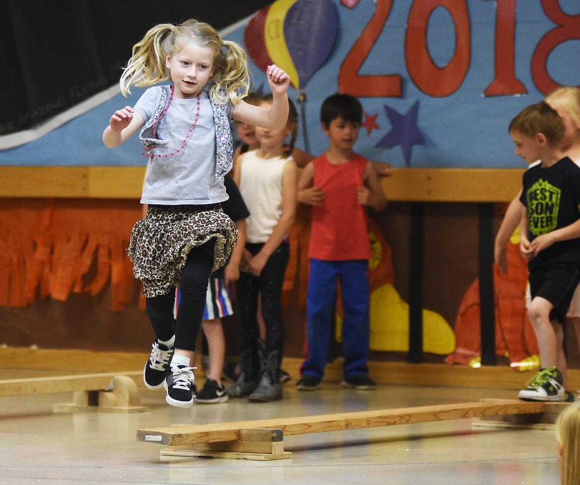 Acrobats leap off the balance beam during the Muldown Circus last week.