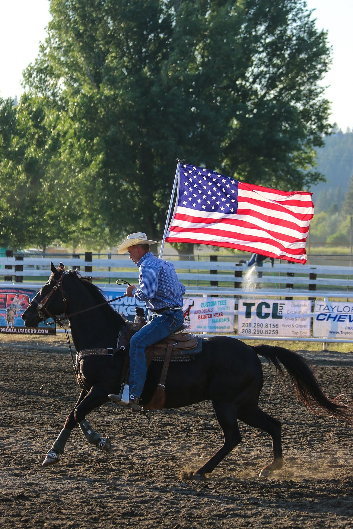 Photo by MANDI BATEMAN
Bull Bash 2018. Andy Rice and his horse show excitement for both carrying the flag and the coming events.