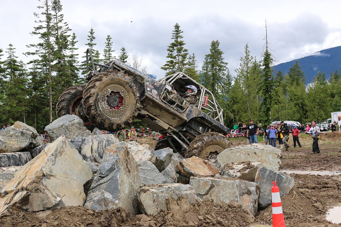 Photo by MANDI BATEMAN
Jeff Noggle from Canada climbs the rocks in his rig.