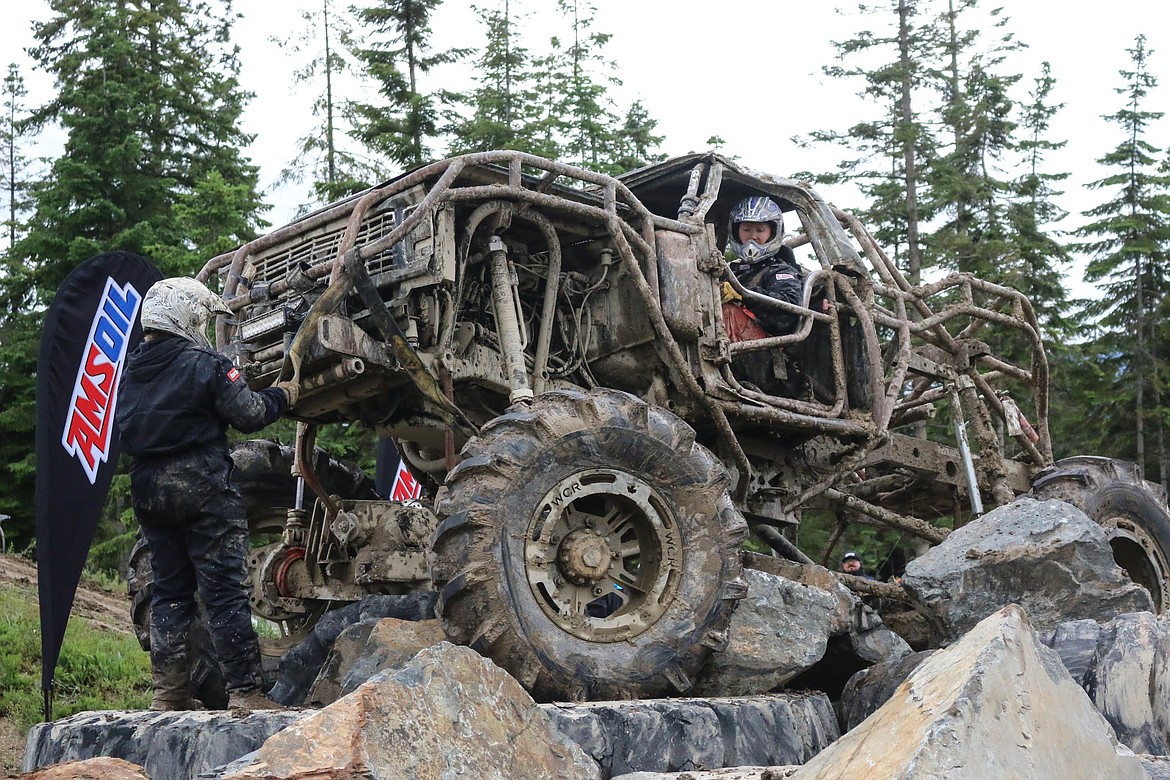 Photo by MANDI BATEMAN
Hooking up a winch after getting firmly stuck.