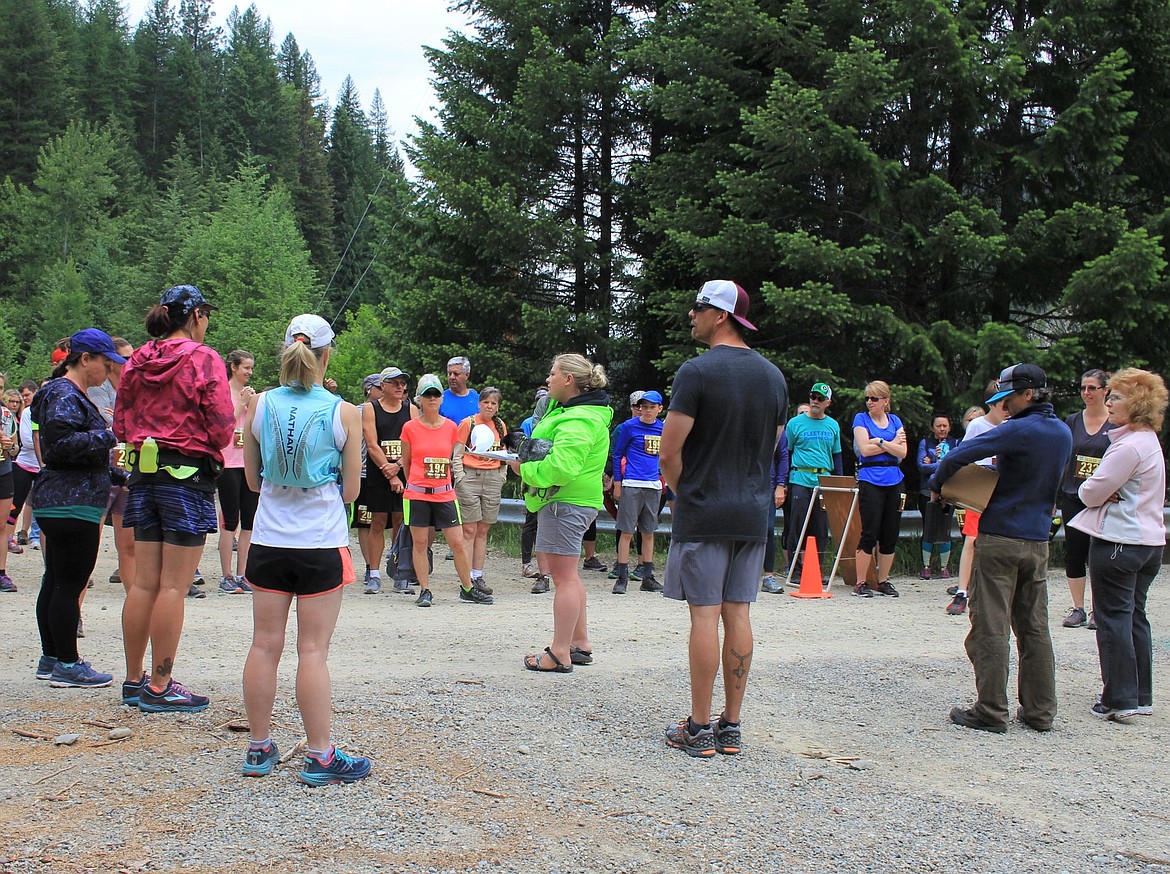 Race Director Tyler Cheesman addresses runners at the start of the 12K at Ward Creek Road near St. Regis for the 2018 Trail Rail Run on Sat. June 9. (Kathleen Woodford/Mineral Independent)