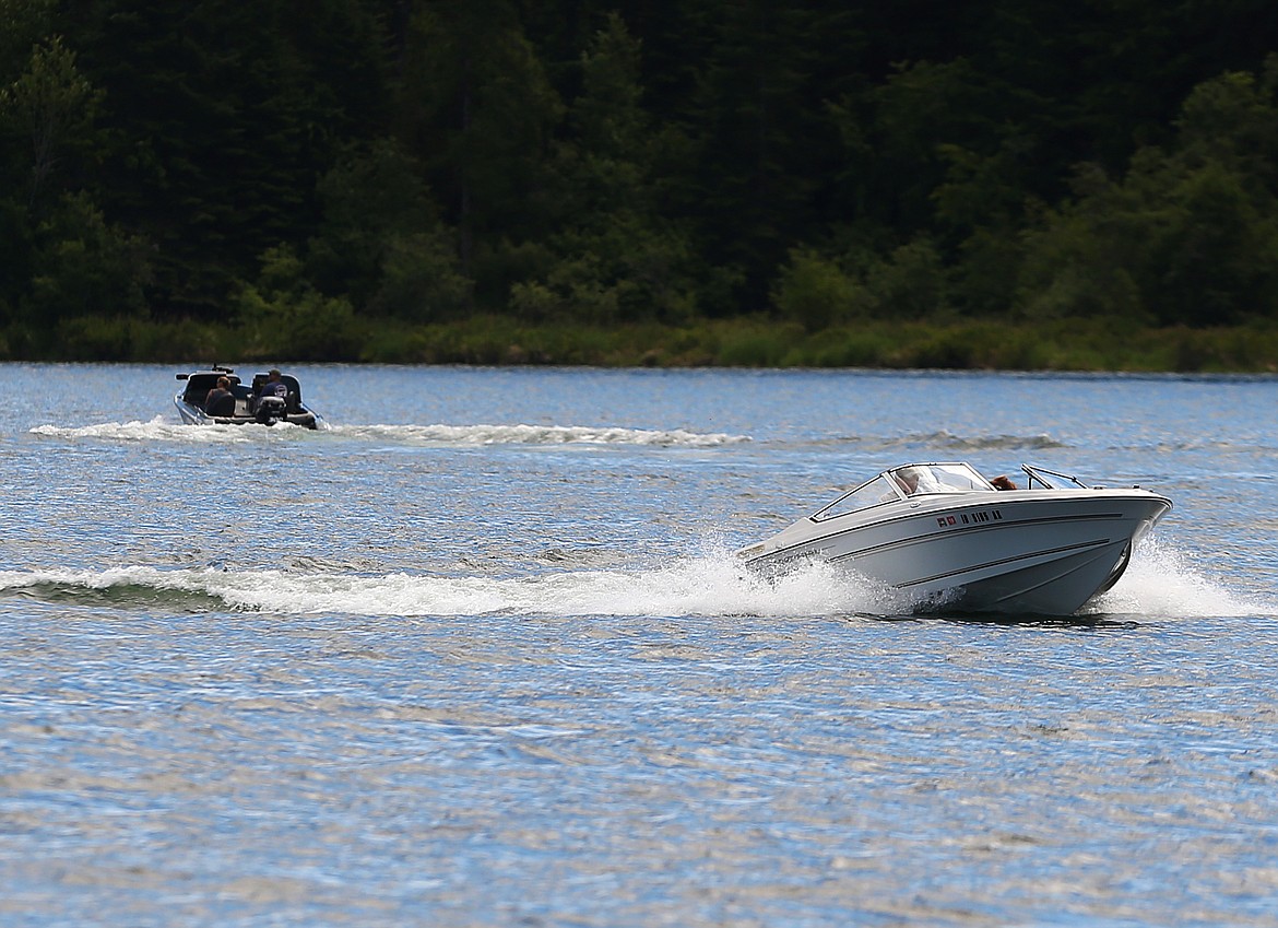 Kootenai County plans to draft ordinances aimed at restoring order on waterways, including noise control and eliminating side tying of boats. (LOREN BENOIT/Press)