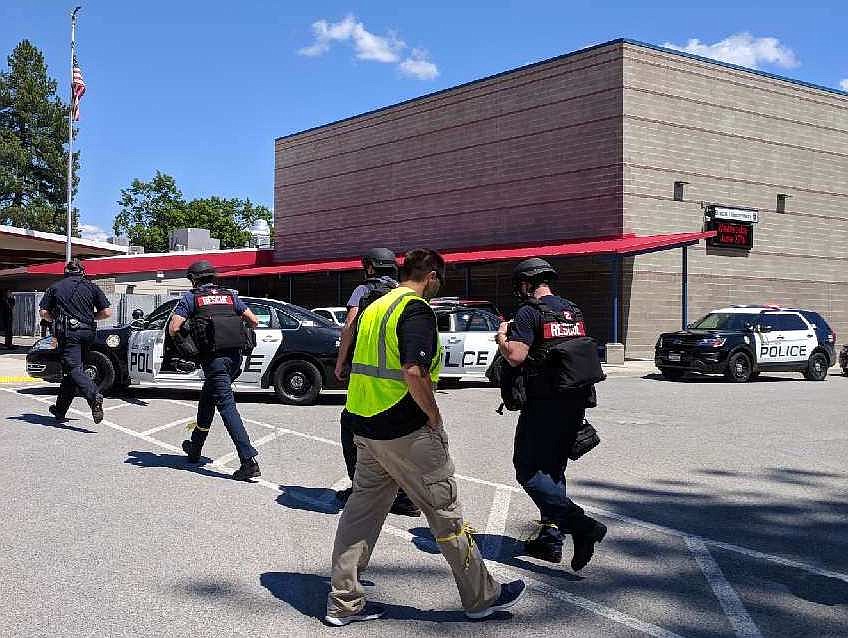 (COEUR D&#146;ALENE POLICE DEPARTMENT/Courtesy)
Firefighter emergency medical personnel work with Coeur d&#146;Alene police officers during an active shooter training June 20 at a Coeur d&#146;Alene elementary school.