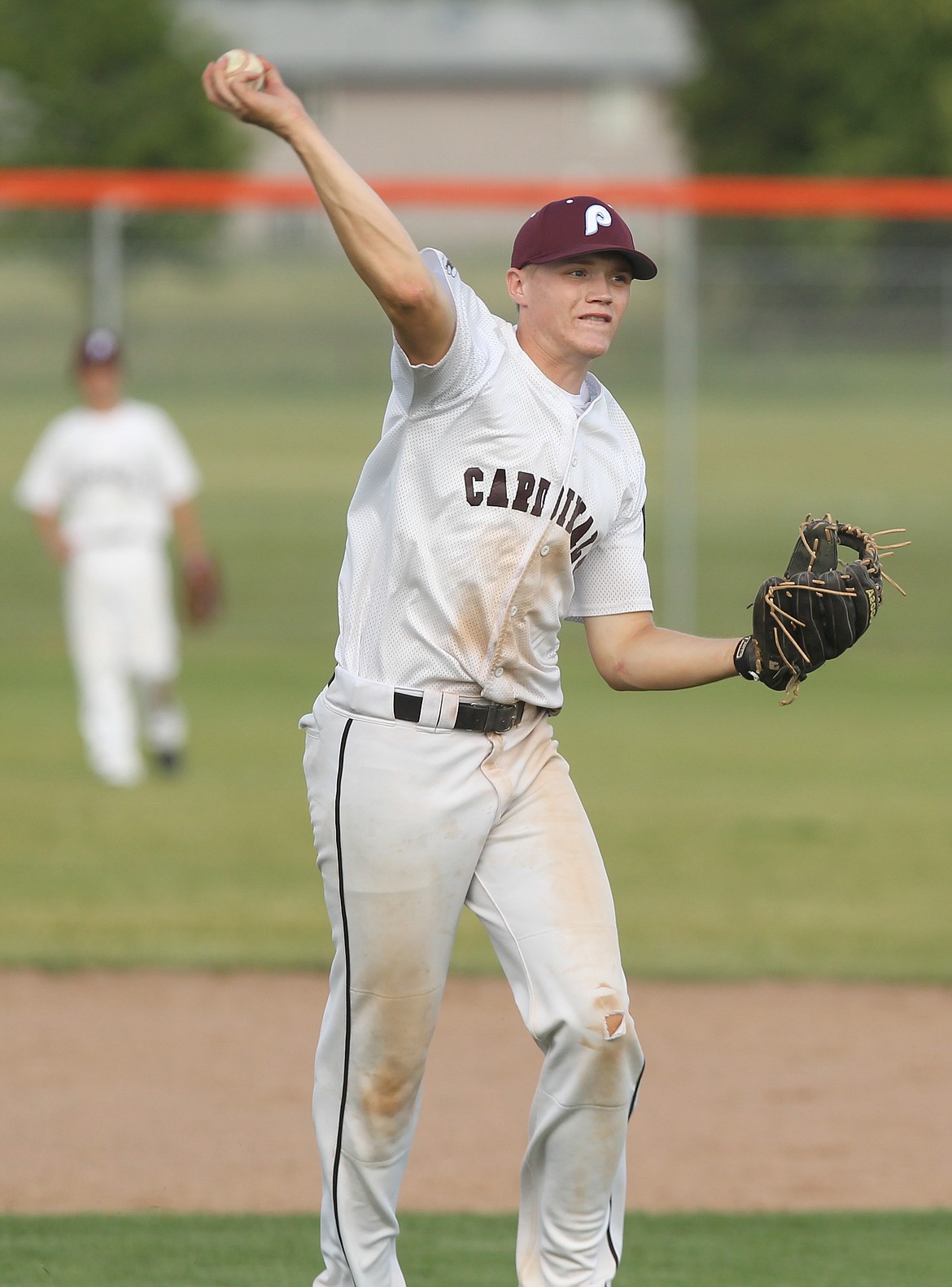 After charging a grounder, Prairie shortstop Tanner McCliment-Call throws to first base against Coeur d&#146;Alene.