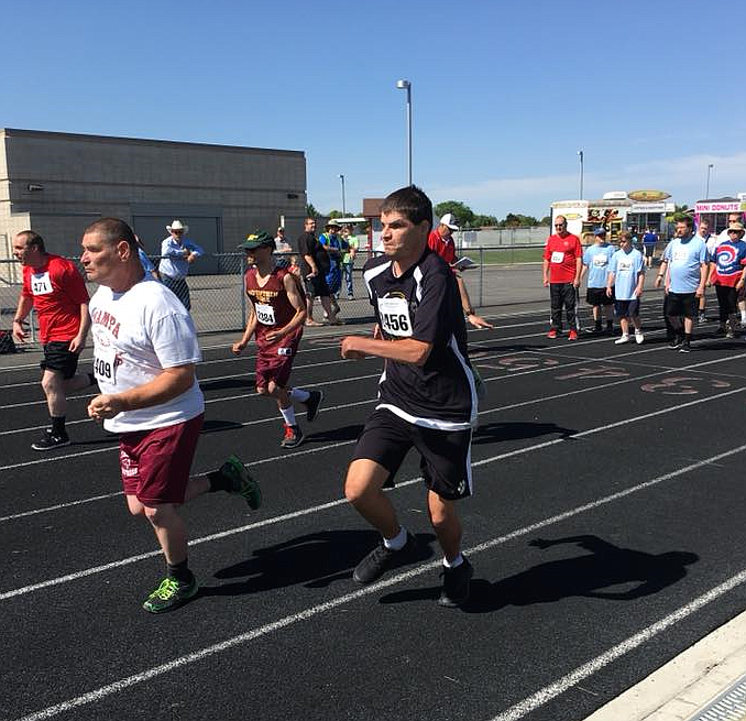 (Photo by COLLEEN DICE)
Priest River 27 year-old Cody Schryver, pictured right in black, will represent Idaho in three events at the upcoming USA Games in Seattle.