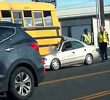 Passenger vehicle collides with bus