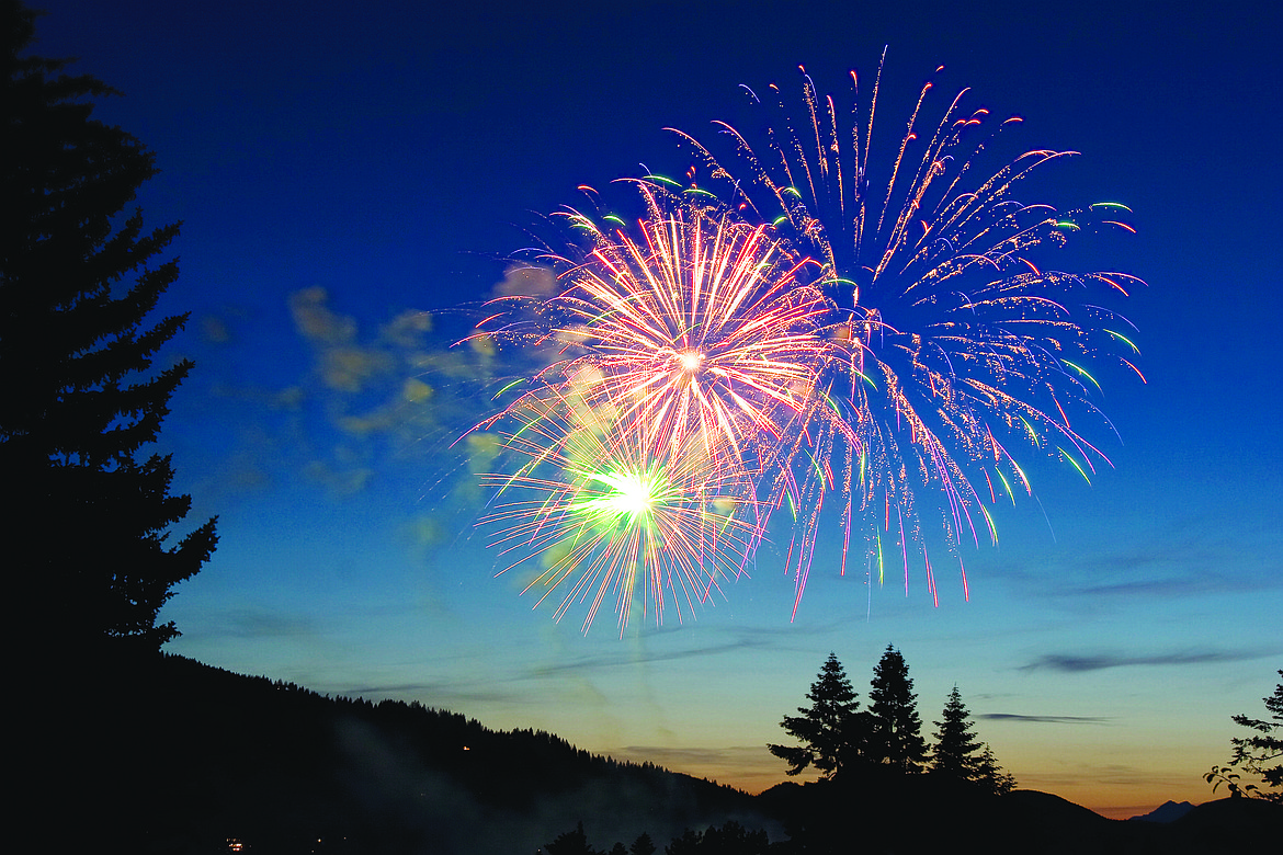 Allison Money/Daily Inter Lake
Whitefish's annual Fourth of July fireworks display lights up the sky at dusk Saturday evening over Whitefish Lake.