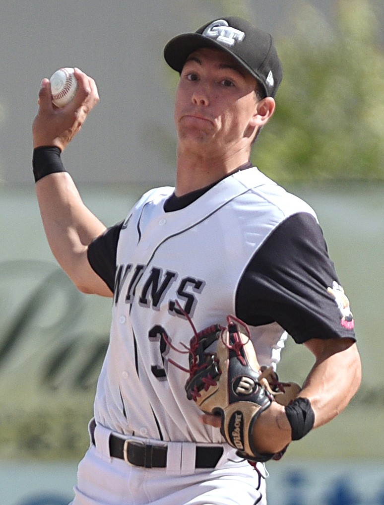 Glacier Twins A second baseman Tommy Hellwig throws to first after fielding a grounder against Libby Loggers A at Memorial Field in Whitefish. (Casey Kreider/Daily Inter Lake)