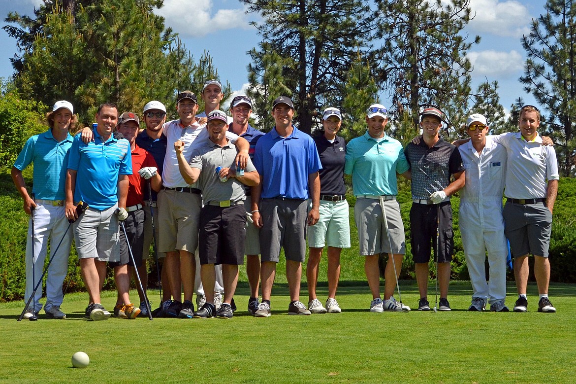 Courtesy photo
Jeff Marfice, leaning on his clubs second from left, will be remembered during the first Marfice Masters golf tournament July 7 at the Coeur d&#146;Alene Public Golf Course. Marfice was just 29 when he died last summer after being punched and hitting his head during a confrontation downtown Coeur d&#146;Alene. His friends and loved ones have coordinated the tournament to celebrate his memory as well as his love of golf and giving back to his community.