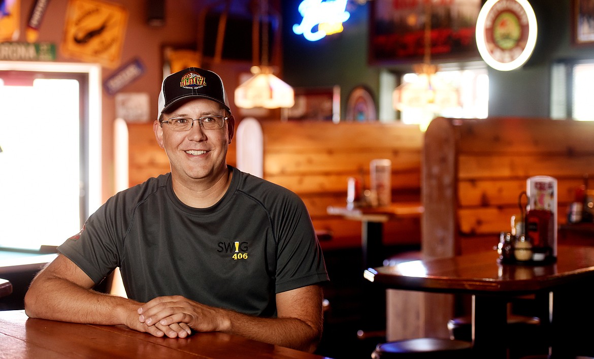 Bobby Lincoln, co-owner of Del&#146;s Bar in Somers, was one of six locals to be included on the committee that created the SWIG406 app. (Brenda Ahearn photos/Daily Inter Lake)