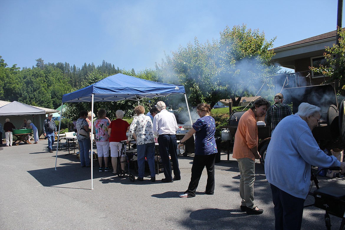 Photos by TANNA YEOUMANS
The Friends of the Restorium&#146;s annual picnic on Sunday, June 24,served many people tantalizing food and raised money for the Restorium residents.