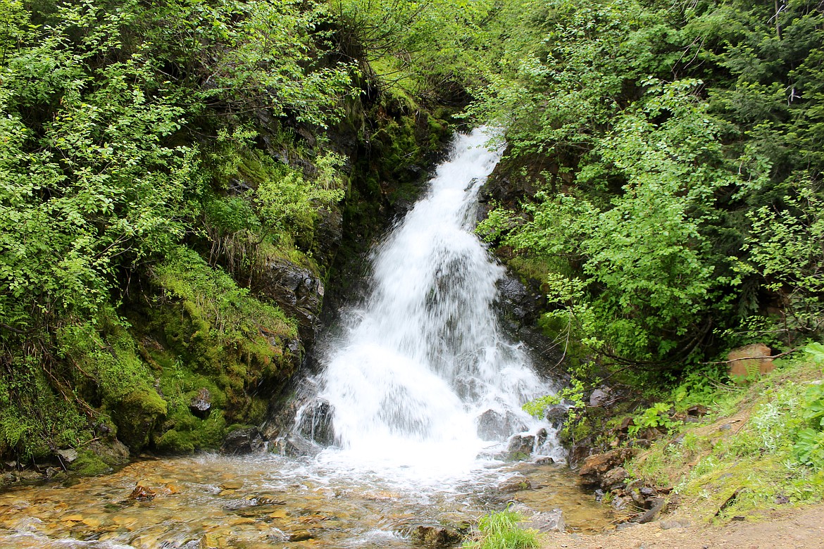 Photo by CHANSE WATSON
A waterfall that is positioned just outside the St. Paul Pass Tunnel&#146;s West Portal. The area is a great place to warm up after the chilly 1.7-mile ride through the tunnel.