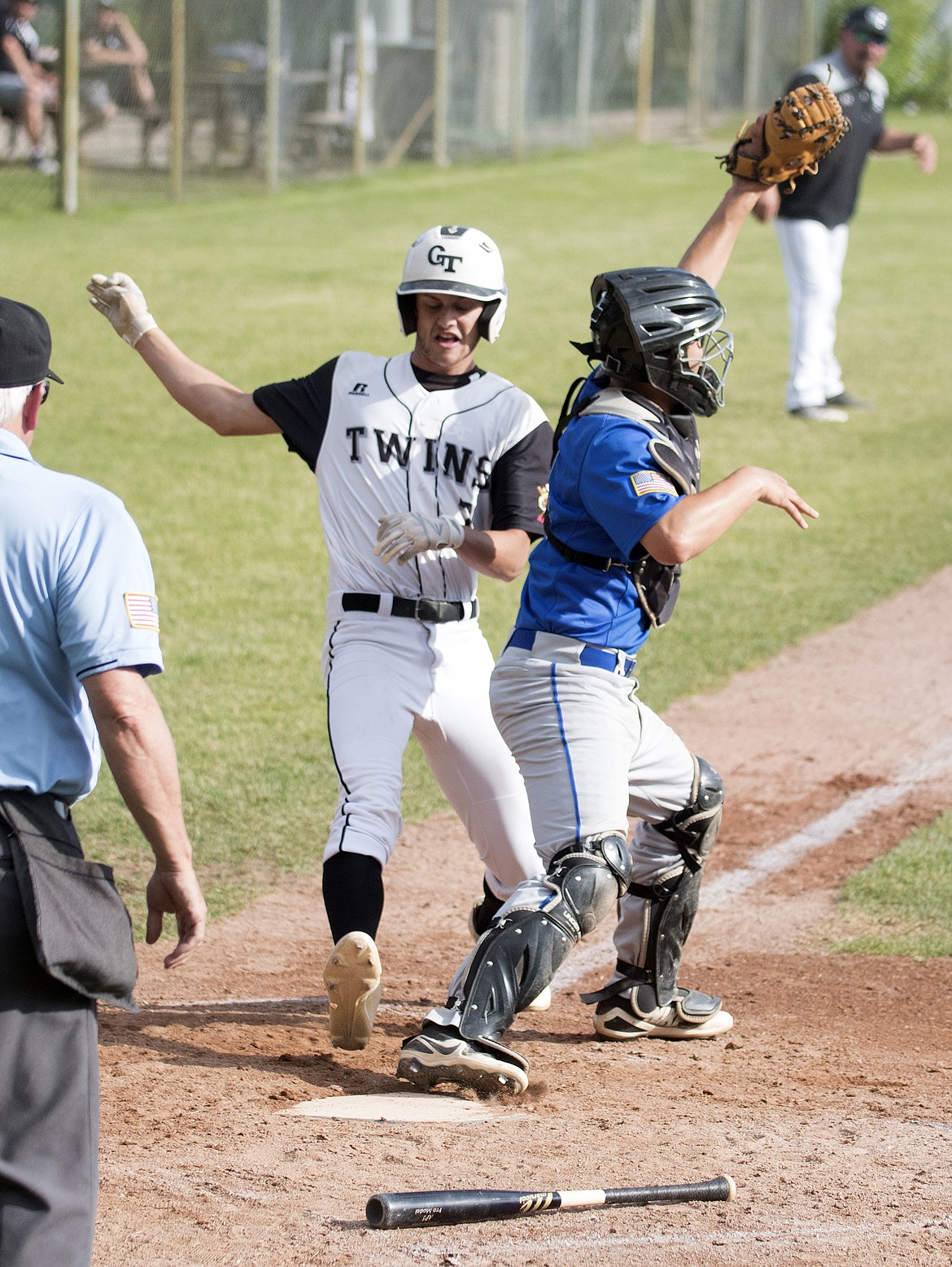 Nathan Hader is called out at the plate Thursday as the Twins took on Yakima. (Jeremy Weber photo)