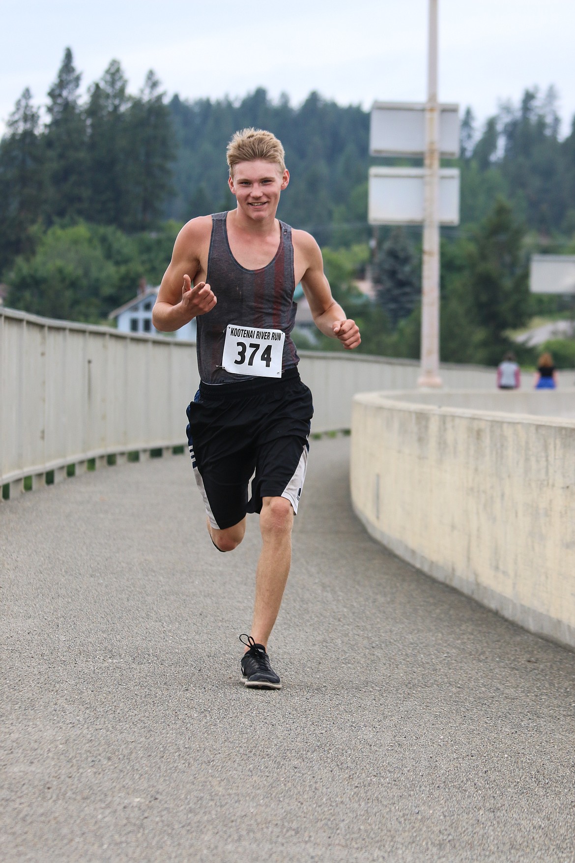 Photo by MANDI BATEMAN
Caleb Gleason, winner of the Men&#146;s 5K, leading the pack.