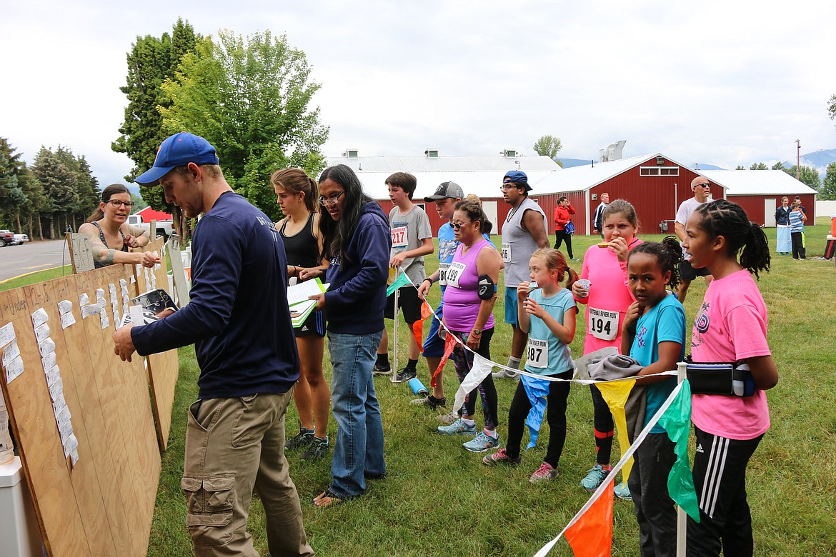 Photo by MANDI BATEMAN
The competitors eagerly watch the times going up.