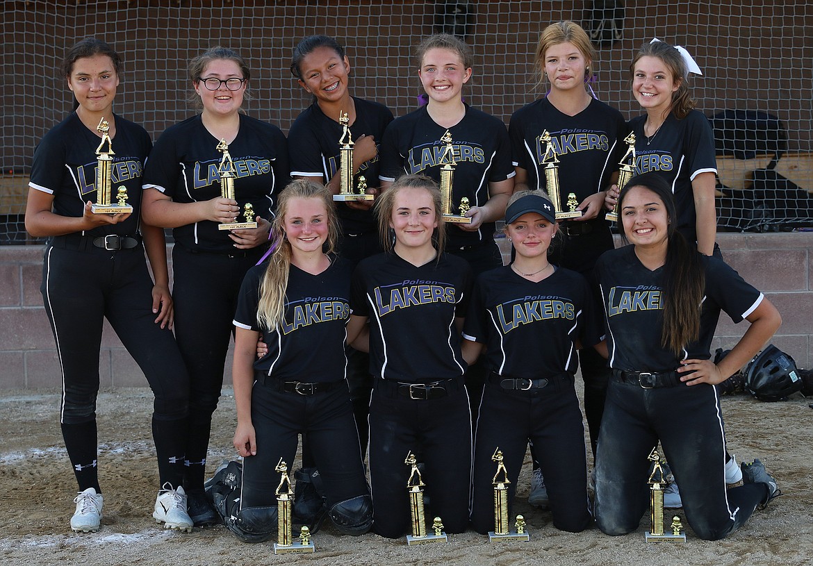 THE POLSON 14-U ASA fastpitch team poses after capturing the 14-U Fastpitch Fury Sizzler championship Saturday afternoon at Frenchtown. (top row, from left): Aubrey Marshall, Anna Vert, Katelyne Druyvestein and SaVanna Carpentier. (Back row, from left): Mesa Bell, Lizzy Scabbyrobe, Turquoise Pierre, Kallie Finkbeiner, Gianna Fyant and Ellie Thiel. (photo courtesy of Bob Gunderson/Lake County Leader)