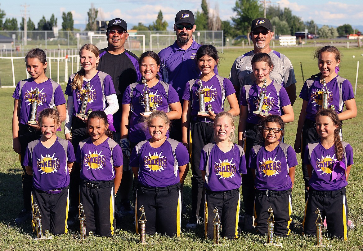 THE POLSON 10-U Lil Lakers pose after capturing the ASA 10-U Frenchtown Fury Fastpitch Sizzler championship at Frenchtown High School. (front, from left): Emma Smith, Samantha Rensvold, Ally Paul, Madison Turner, Keke Tenas and Natalie Nash. (Back row, from left):  Jelayna Tenas, Alyssa Orien, Summer Newman, Sierra Perez, Isabo Fyant and Olivia Jore. Coaches (from left): Juan Perez, Lyle Smith and Jim Jore. (photo courtesy of Bob Gunderson)