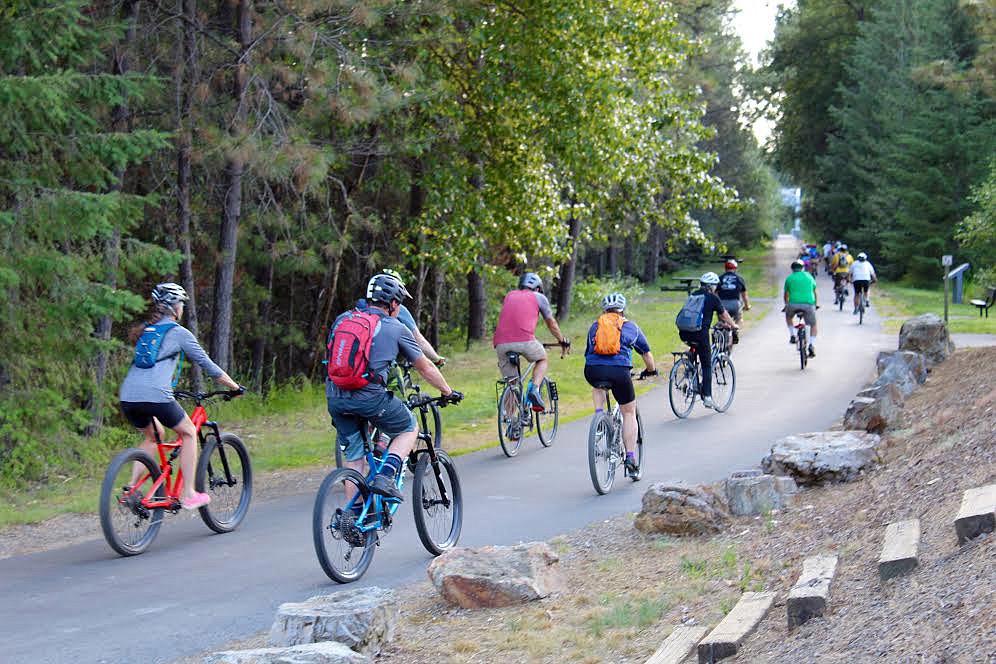 Riders round the first corner of the 13 mile race and head toward Cataldo.