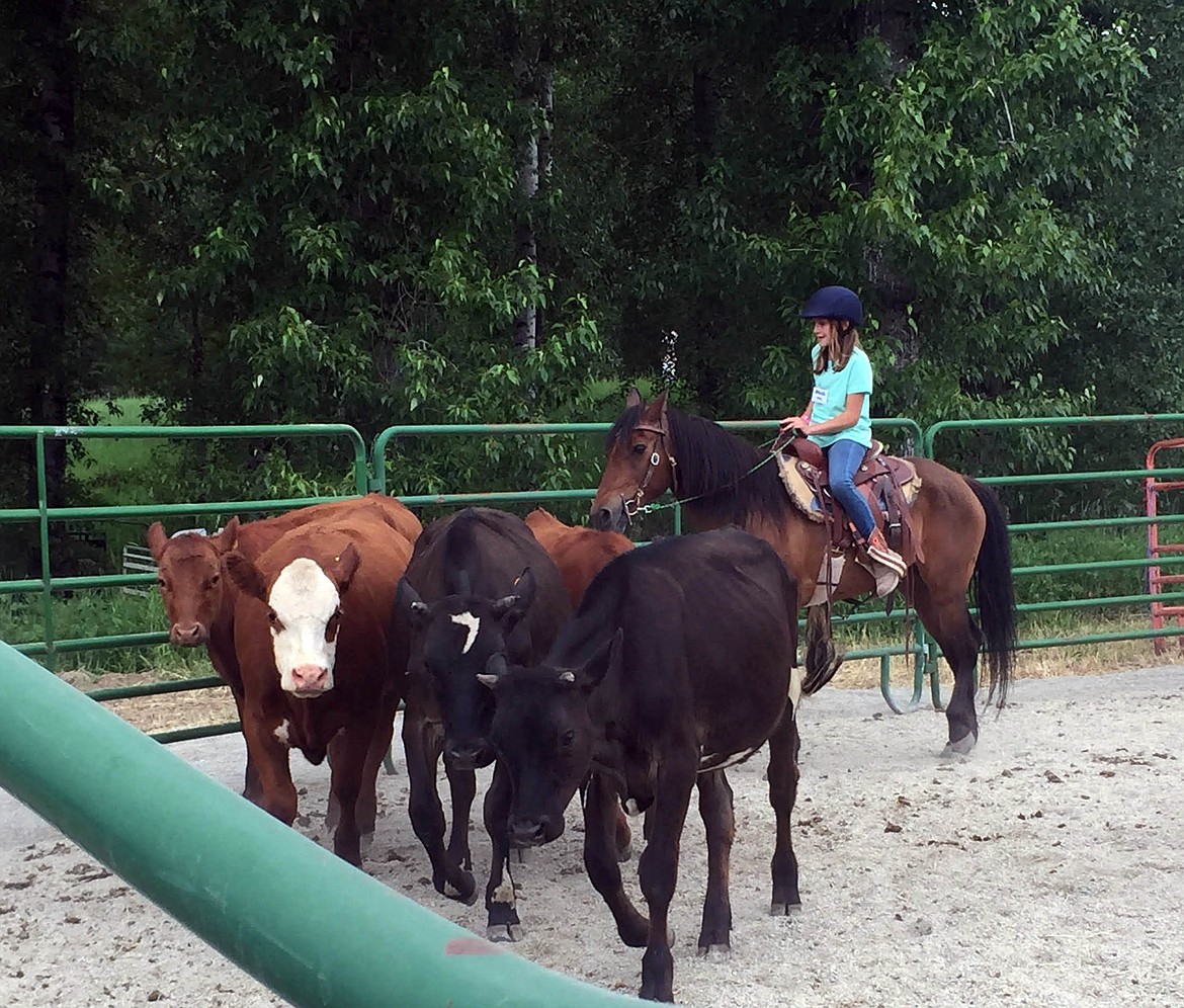 Courtesy photo
Aleah Philp, one of the newest members of the Easy Riders 4-H Club, shows off her newest horseback skills during the Kootenai/Shoshone County 4-H Horse Camp.