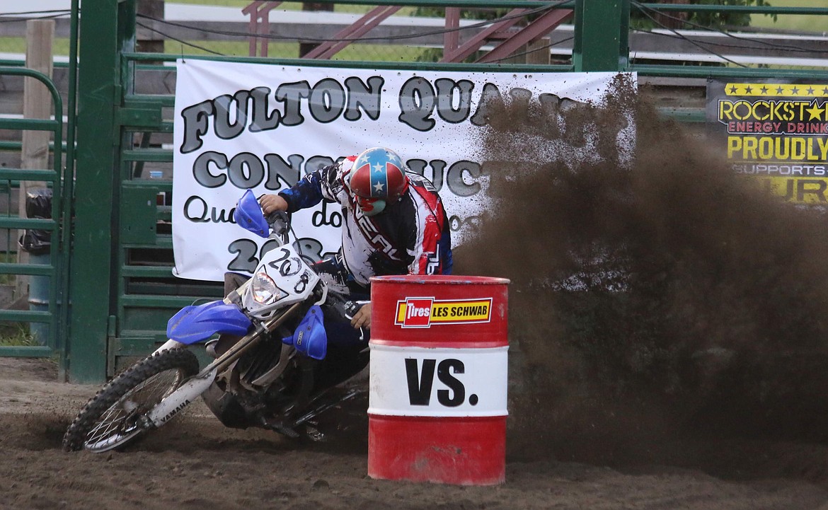 Photos by MANDI BATEMAN
Riders toss up some dirt during Saturday&#146;s Horsepower Collides event at the Boundary County Fairgrounds. The power of horses matched up against the power of dirt bikes in a timed event.