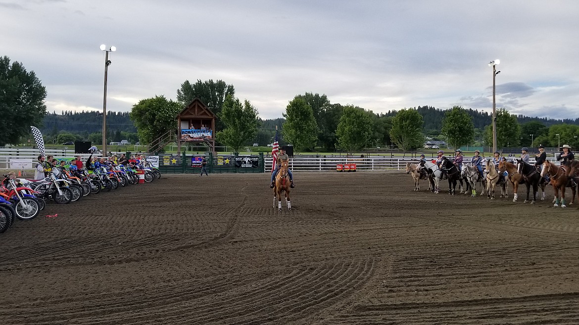 Photo by MANDI BATEMAN
Horsepower on both sides lines up to honor the American flag.