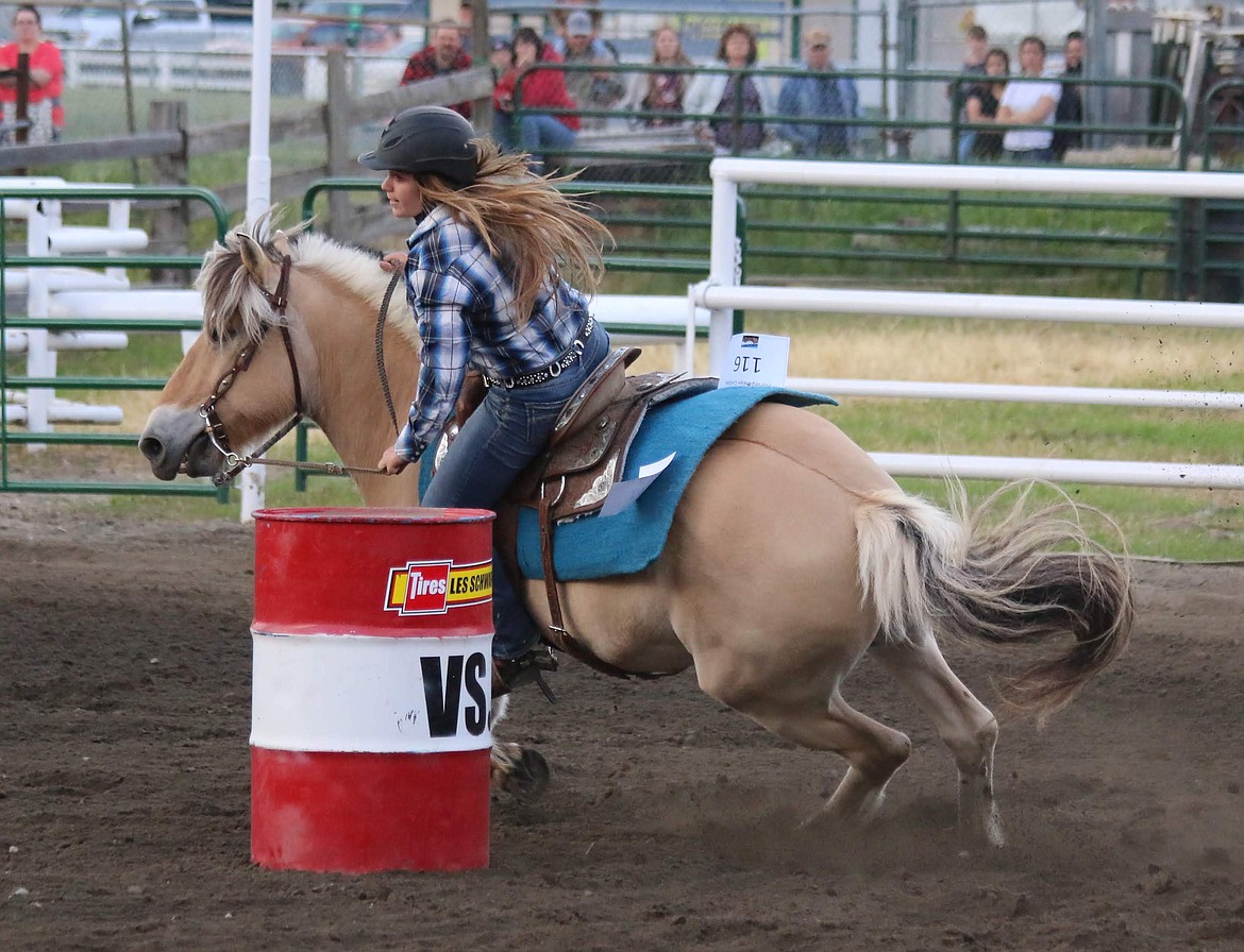 Photo by MANDI BATEMAN
Malia Sandalin on her Fijord raced around the barrel during the competition.