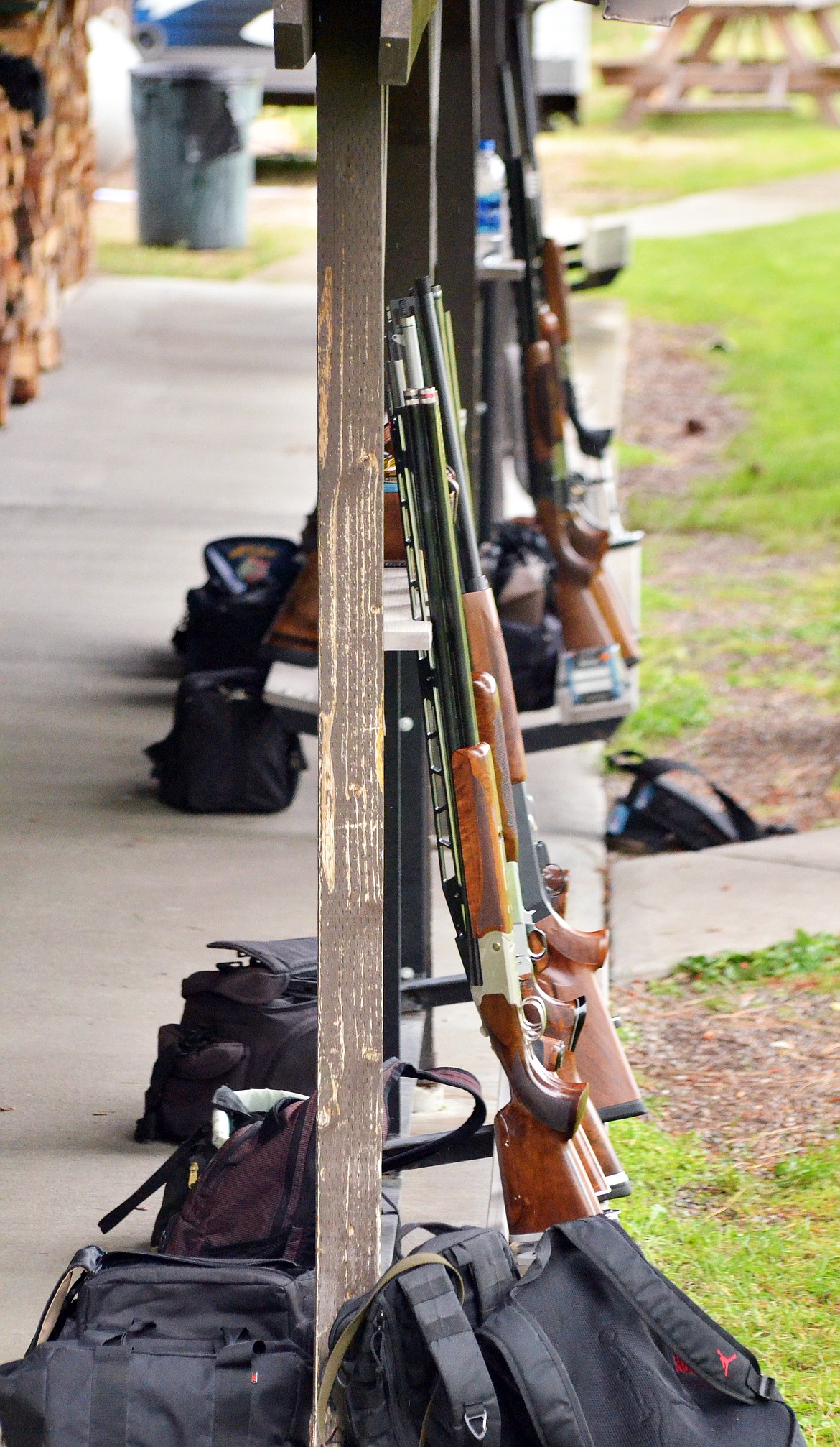 Shooters took advantage of the shot gun bar to park their bags while waiting to take to the traps (Erin Jusseaume/ Clark Fork Valley Press)