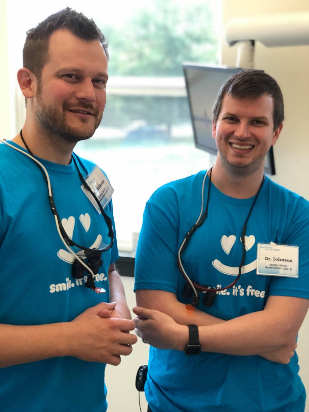 Dr. Taylor Wilkens (L) and Dr. Matthew Johnson (R) drove over from Spokane to help their friends Dr. Andrew and Elizabeth Ordelheide for the Free Dental Day (Erin Jusseaume/ Clark Fork Valley Press)