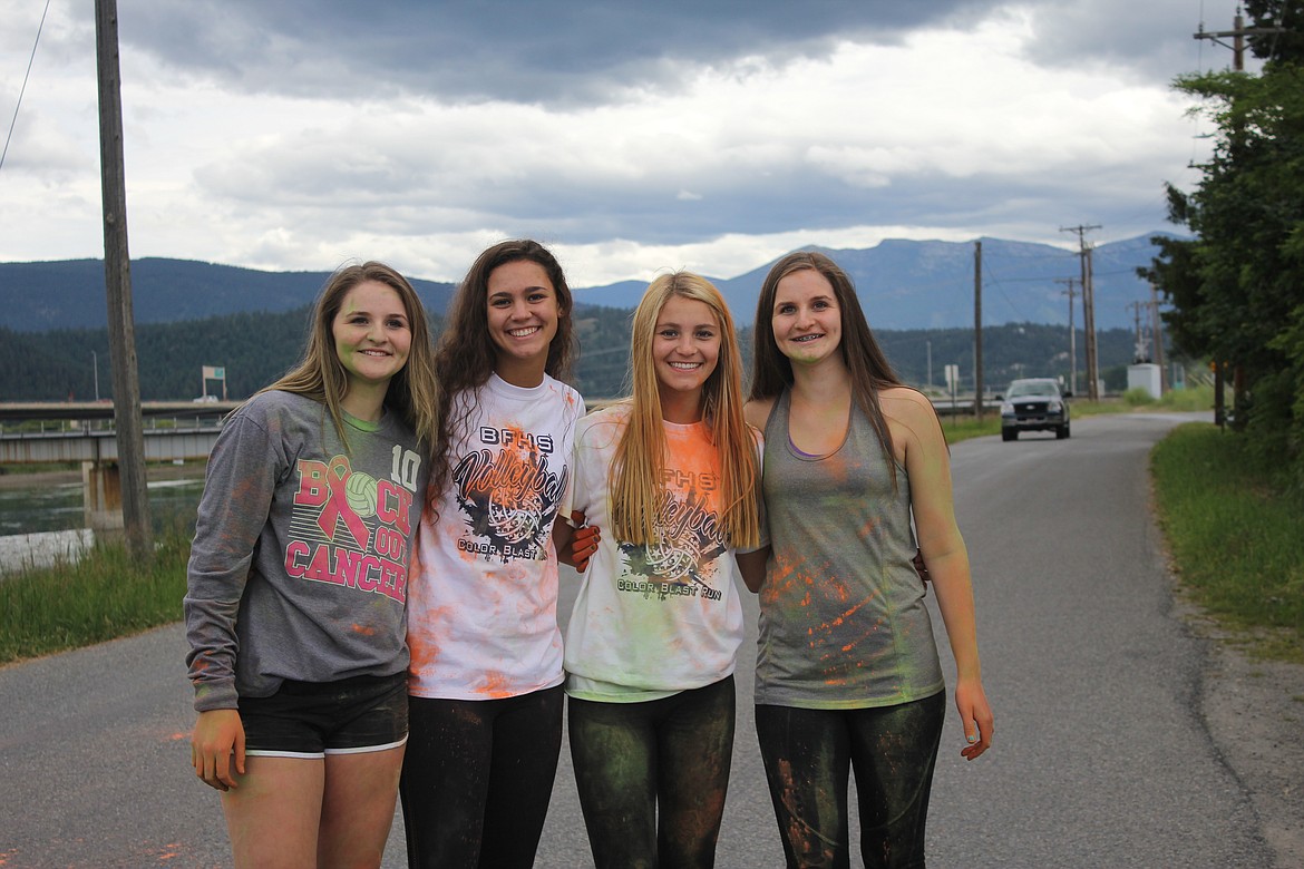 Mercedes Hill, Sydney Nelson, Maecie Lierman and Sierra Hill participated with some running and tossing chalk at the runners.