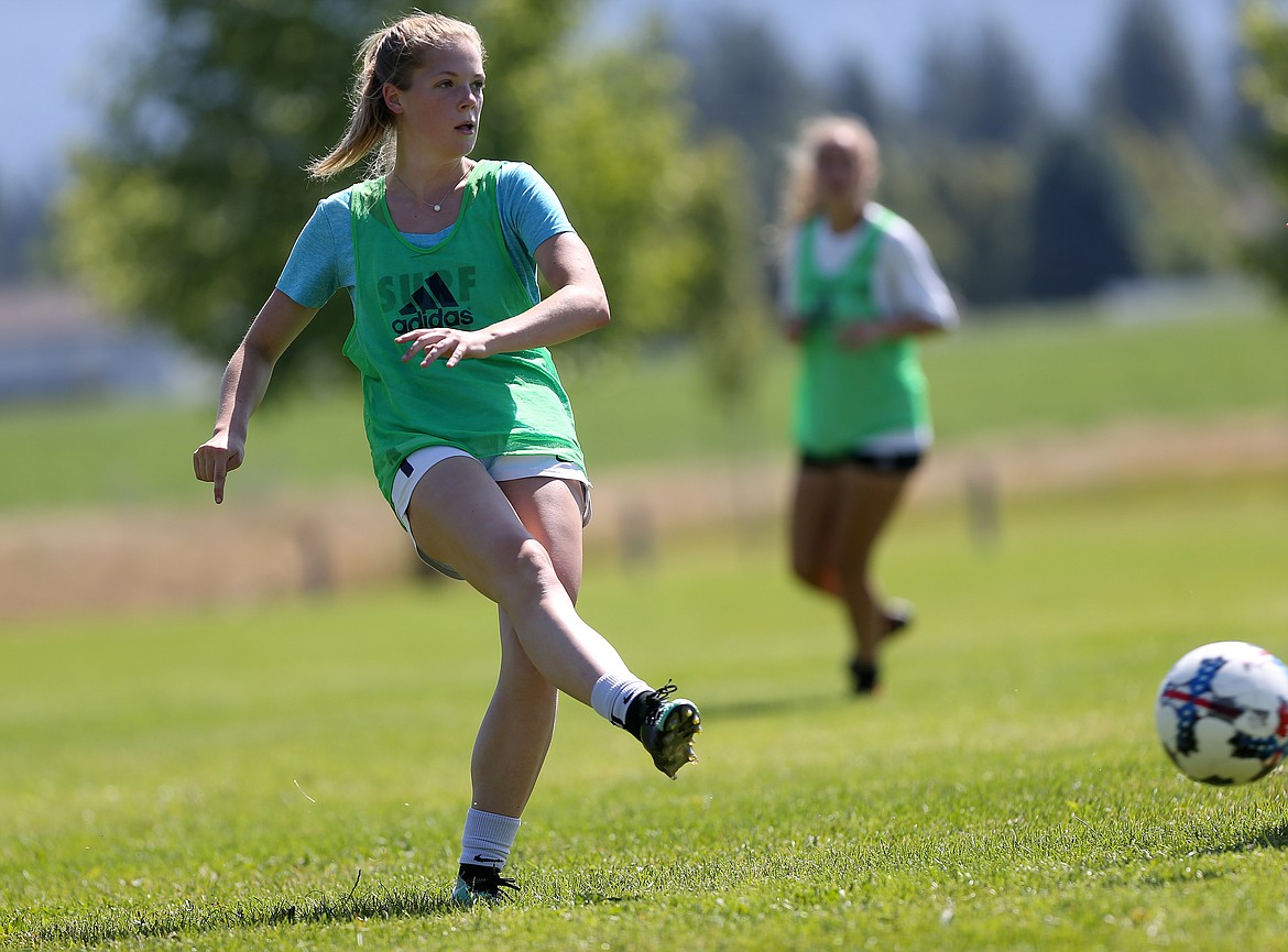 Tiana Cydell passes the soccer ball to a teammate during a Sting Timbers practice Friday morning at the Coeur d&#146;Alene Soccer Complex.
