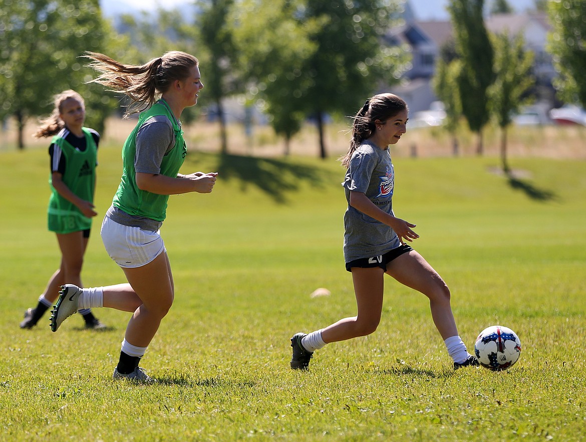 Madyson Smith dribbles the ball during a Sting Timbers practice Friday morning at the Coeur d&#146;Alene Soccer Complex. (LOREN BENOIT/Press)