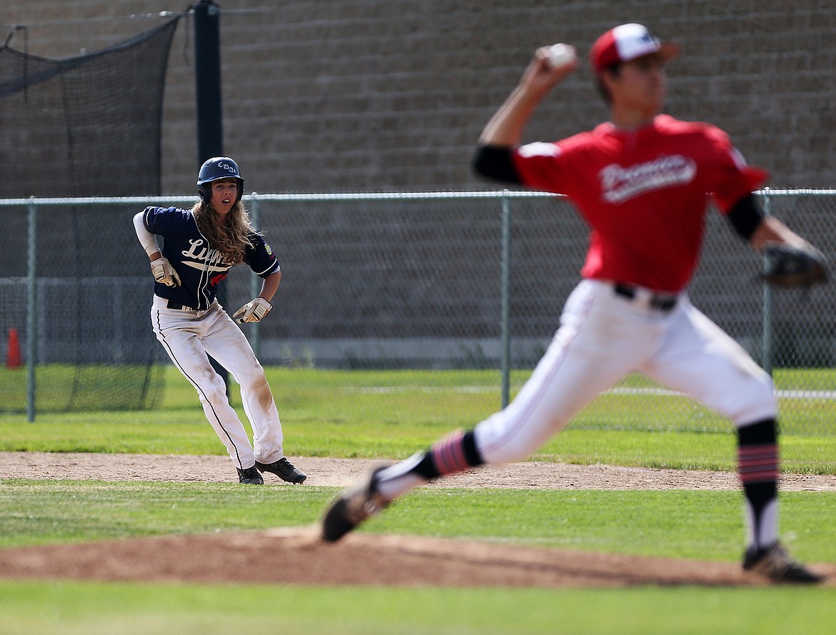 LOREN BENOIT/Press
Coeur d&#146;Alene Lumberman Bennett Cunningham takes a lead off first base in a game against Northwest Premier on Thursday at Thorco Field.
