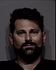 Tech leader charged with domestic violence