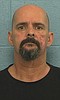 Husband arrested in cold-case slaying