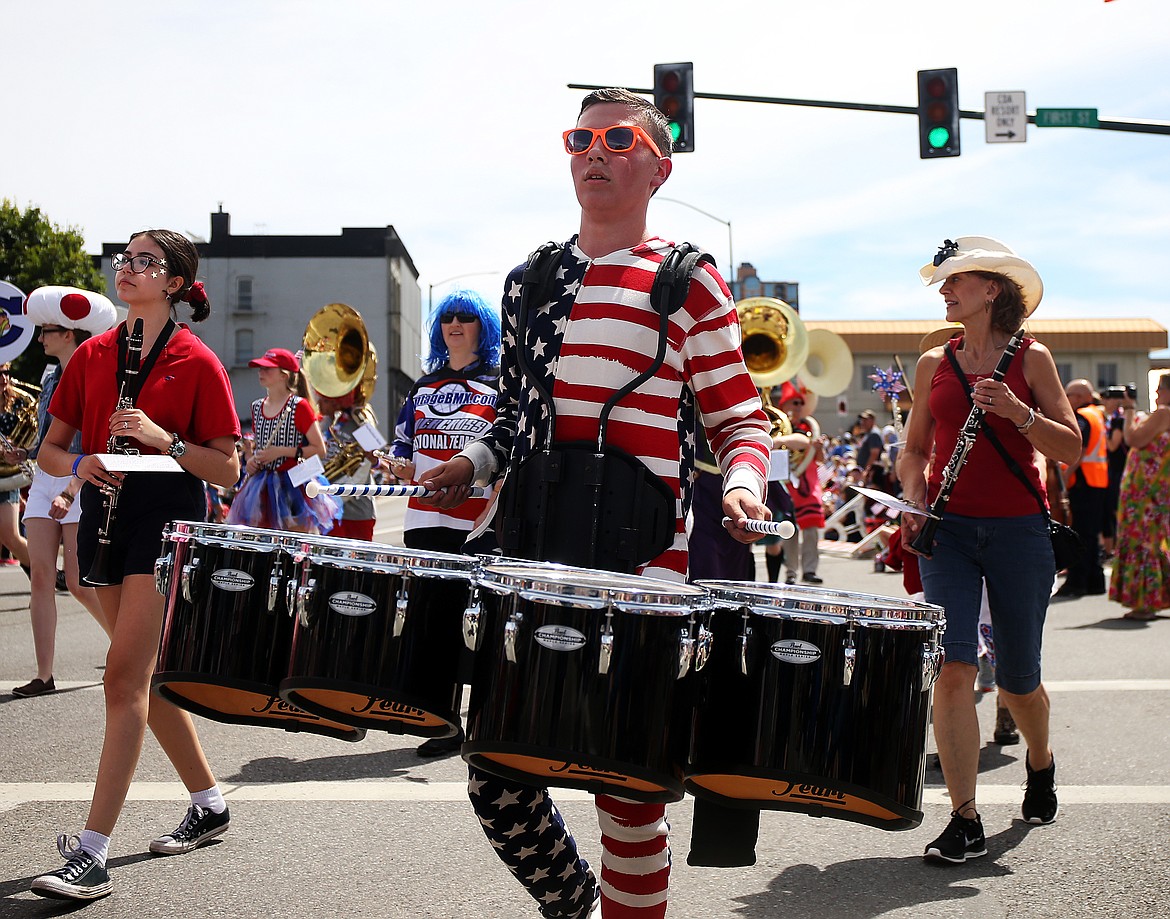Ryker Patterson with the The Perfection-Nots plays his quad to a tune down the Fourth of July parade route on Sherman on Wednesday. (LOREN BENOIT/Press)