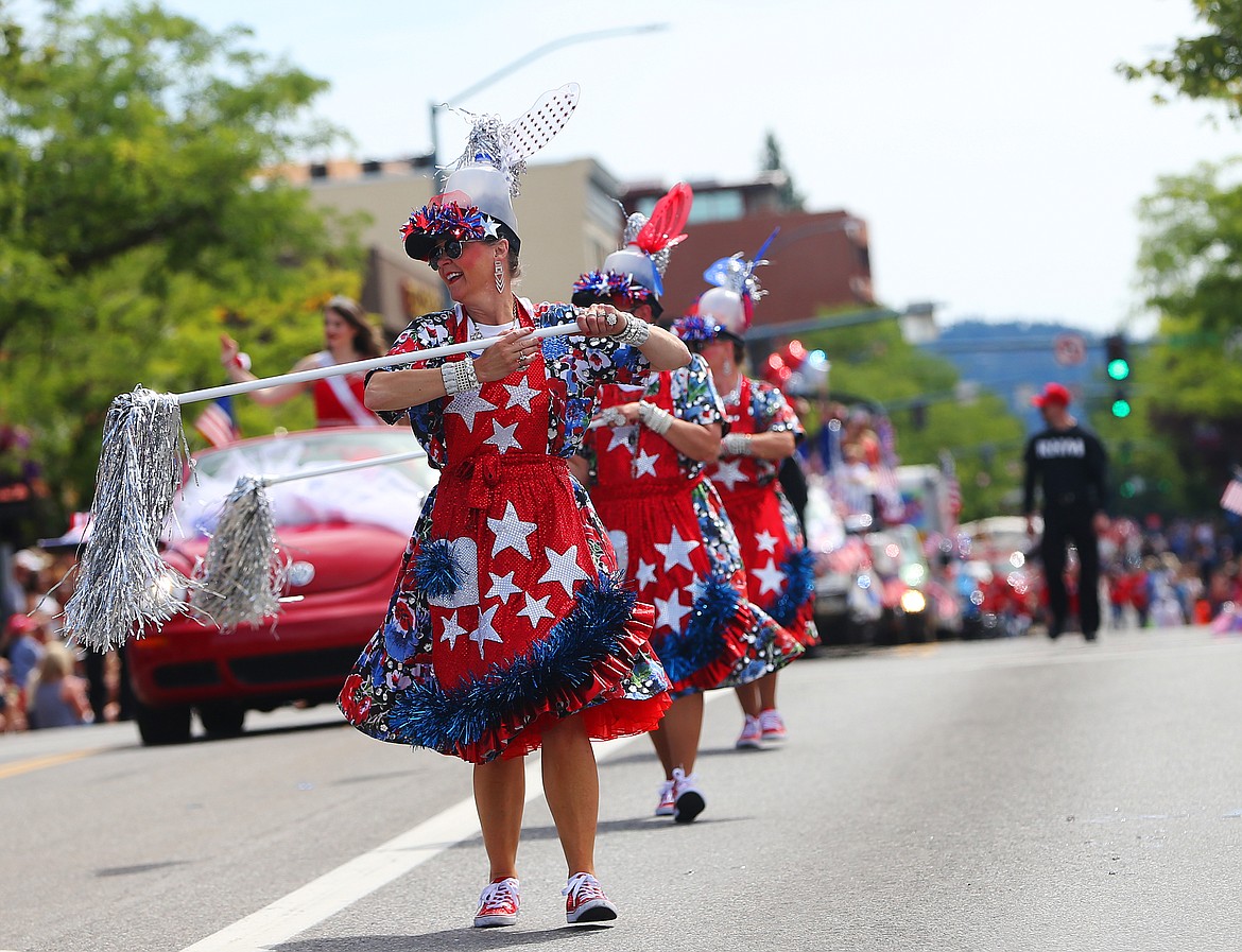 Missy Majnarich with The Red Hot Mamas performs in the Fourth of July parade in downtown Coeur d'Alene.  (LOREN BENOIT/Press)