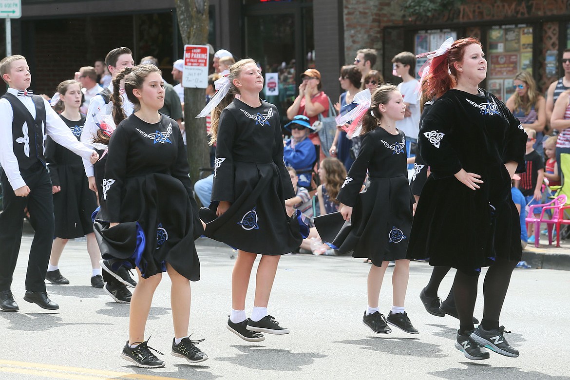 Jacinta Murphy leads girls and boys from Our Lady of Knock Irish Dance Academy in a performance on Sherman Avenue on Wednesday. (JUDD WILSON/Press)