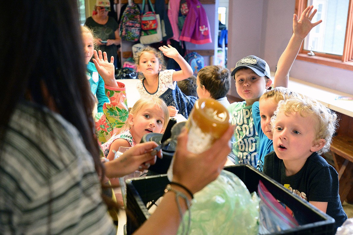 Kindergarten and first-grade students vote to include honey in the class smoothie they are making at Bigfork ACES summer camp on Friday, June 29. Bigfork, Deer Park, Kila and Marion will now operate after-school programs independently of each other following funding cuts. (Casey Kreider/Daily Inter Lake)