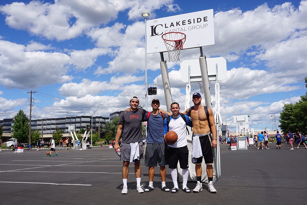 Courtesy photo
Helped by former Post Falls High and University of Idaho standout Connor Hill, the Kodiak Cakes went 5-0 to win their men&#146;s adult standard bracket at Hoopfest in Spokane last weekend. From left are Dan Daviess of Danville, Calif.; Westin Hill of Bakersfield, Calif.; Sam Marcus of Bakersfield and Connor Hill of Post Falls.
Said Marcus: &#147;Our first game was an eye-opener because we got matched up against a very physical team that had us trailing nearly most of the game. After we pulled that victory, we never turned back.&#148; Kodiak Cakes trailed 18-12 in its semifinal game (first team to 20 wins), and went on a 7-1 run to tie the game at 19. Connor Hill sealed the game with a game-winning layup. The Cakes won the title game 24-22 in overtime. &#147;What we lacked for in size, we made up in hard work and I know that&#146;s why we&#146;re able to come out on top,&#148; Marcus said.