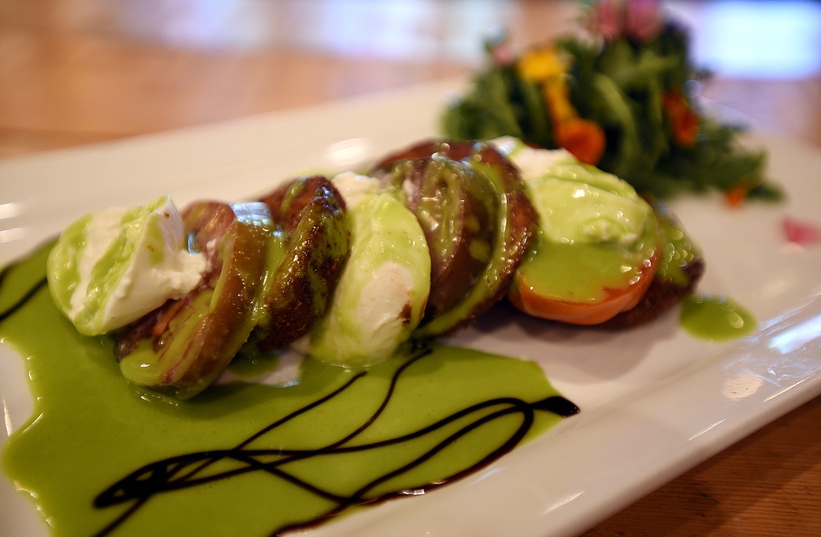 Detail of the Beargrass Bistro caprese salad which adds fried eggplant to the traditional tomatoes and mozzarella cheese.(Brenda Ahearn/Daily Inter Lake)