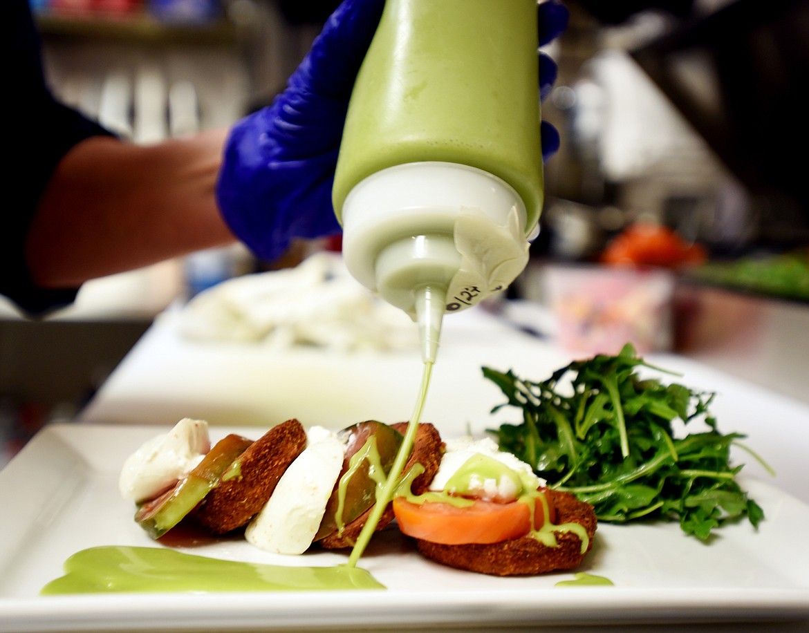 Cece Andersson adds a cilantro and balsamic vinaigrette to her version of a caprese salad which adds fried eggplant to the traditional tomatoes and mozzarella cheese.