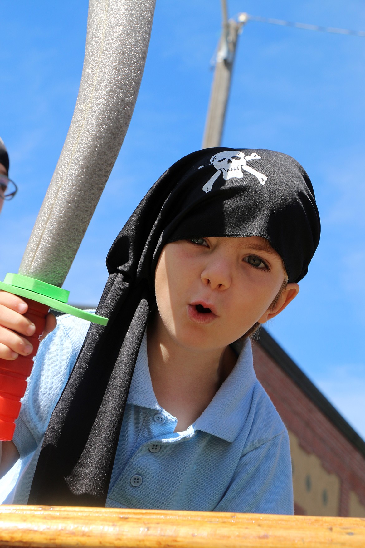 (Photo by CAROLINE LOBSINGER)A young pirate growls at the camera as he takes part in the Sandpoint Lions' Grand Parade on the Fourth of July on Wednesday.